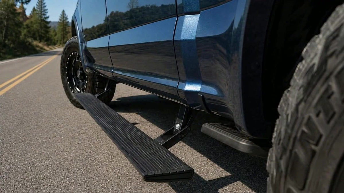 Sentinel electric side step deployed on a pickup truck