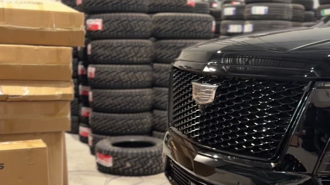 Tires stacked on the First Auto Nation warehouse floor in Edmonton