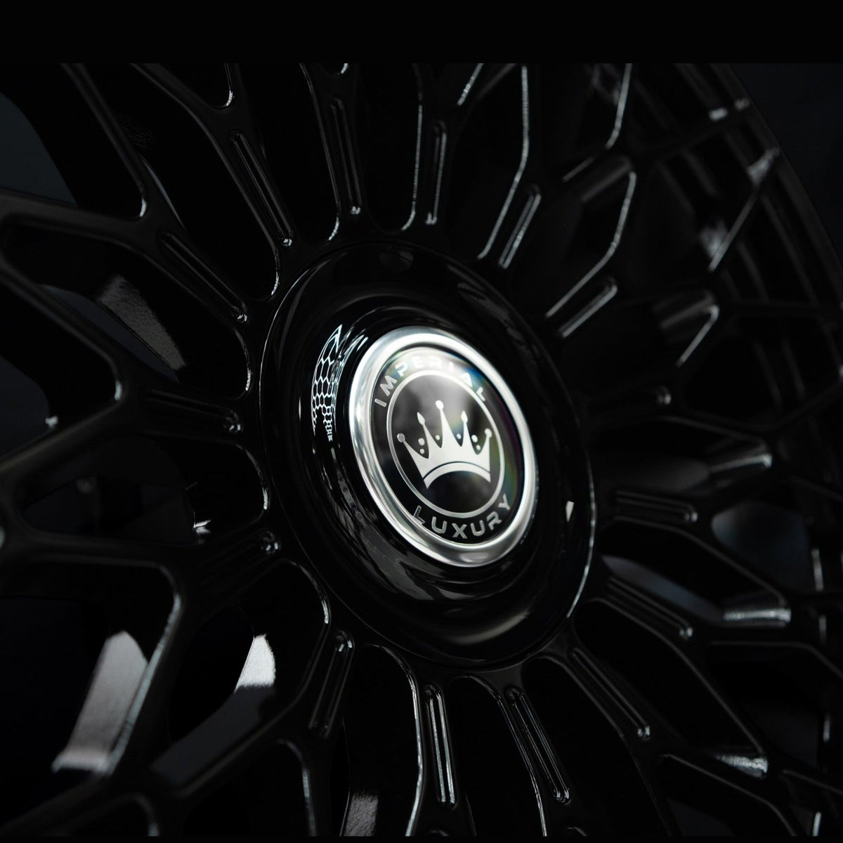 Imperial Luxury Series 2 gloss black alloy wheel at a three-quarter angle showing spoke depth