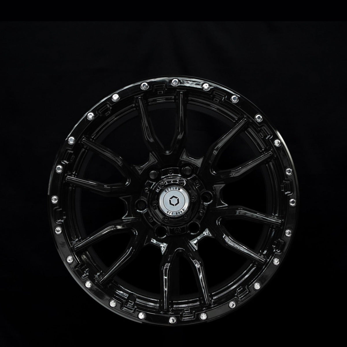 Outlaw Off-Road Rugged 1 gloss black alloy wheel, face view