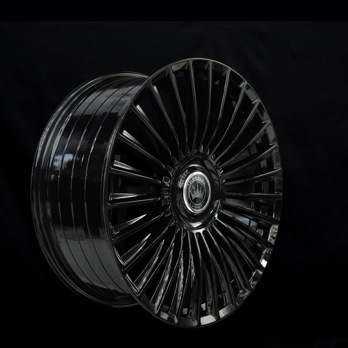 Imperial Luxury Series 1 gloss black alloy wheel at a three-quarter angle showing spoke depth
