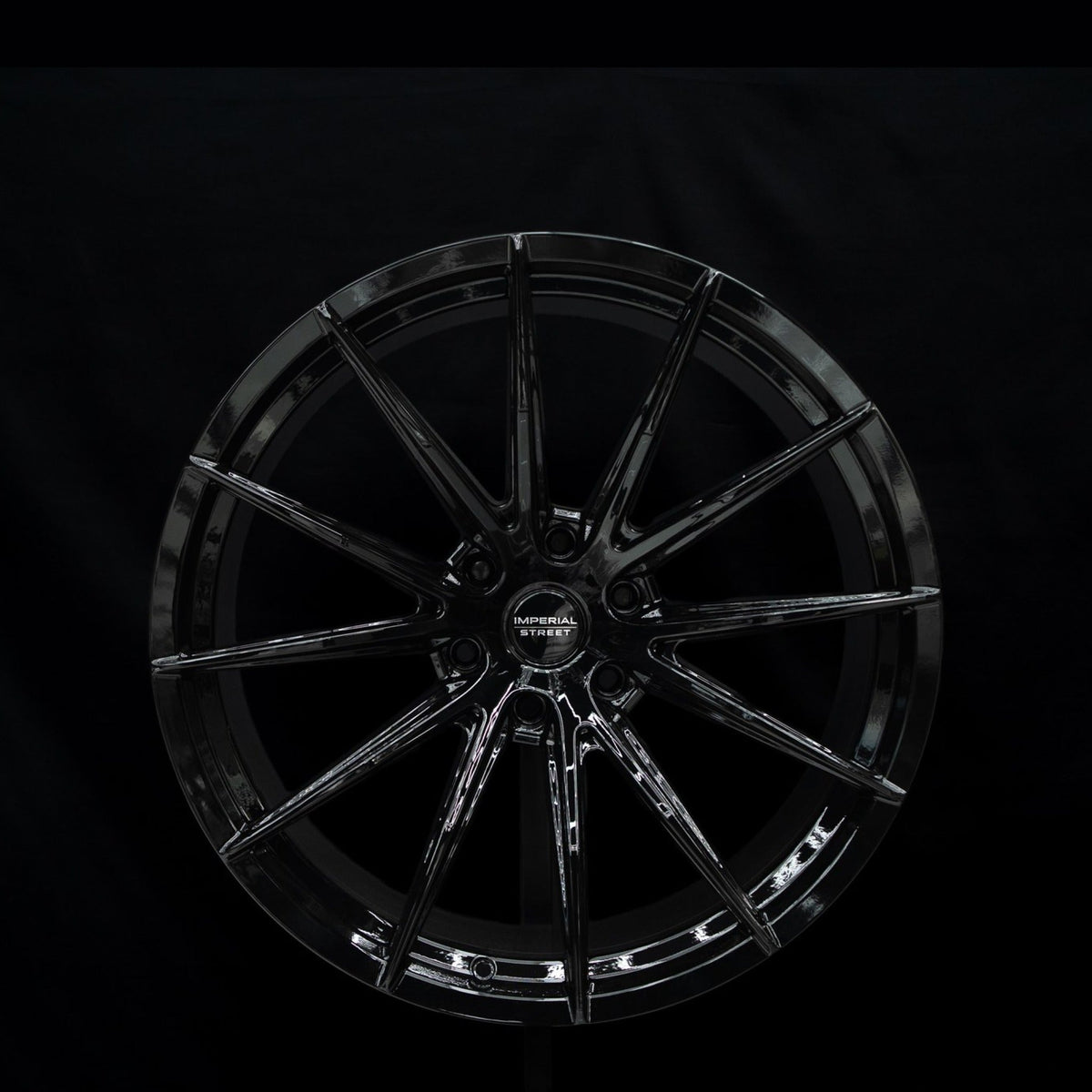 Imperial Street Series 4 gloss black alloy wheel, face view