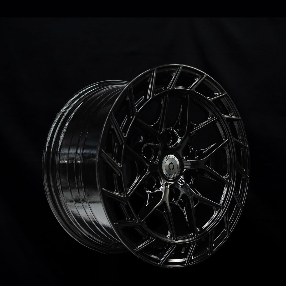 Outlaw Off-Road Series 2 gloss black alloy wheel at a three-quarter angle showing spoke depth