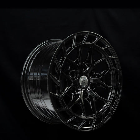 Outlaw Off-Road Series 2 gloss black alloy wheel at a three-quarter angle showing spoke depth