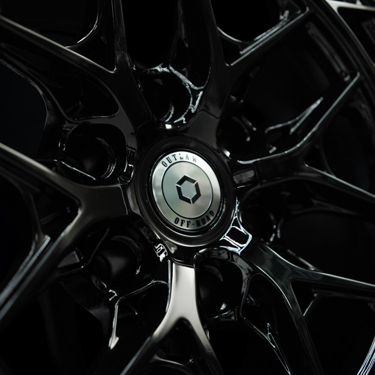Outlaw Off-Road Series 2 gloss black alloy wheel, close-up of the spoke and rim edge finish