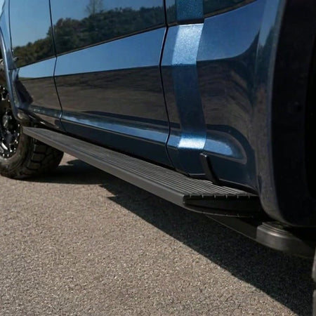 Sentinel electric side steps retracted flush against the rocker panel