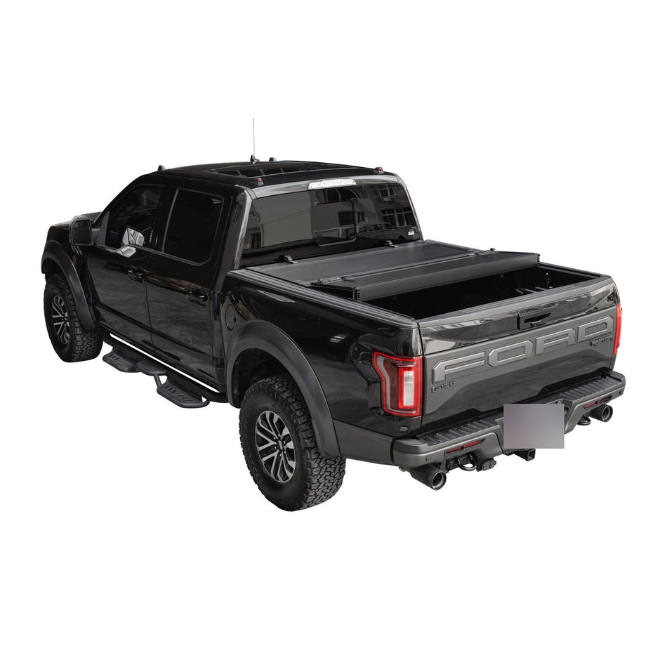 Titan Hard Flip-Back tonneau cover partially folded on the truck bed