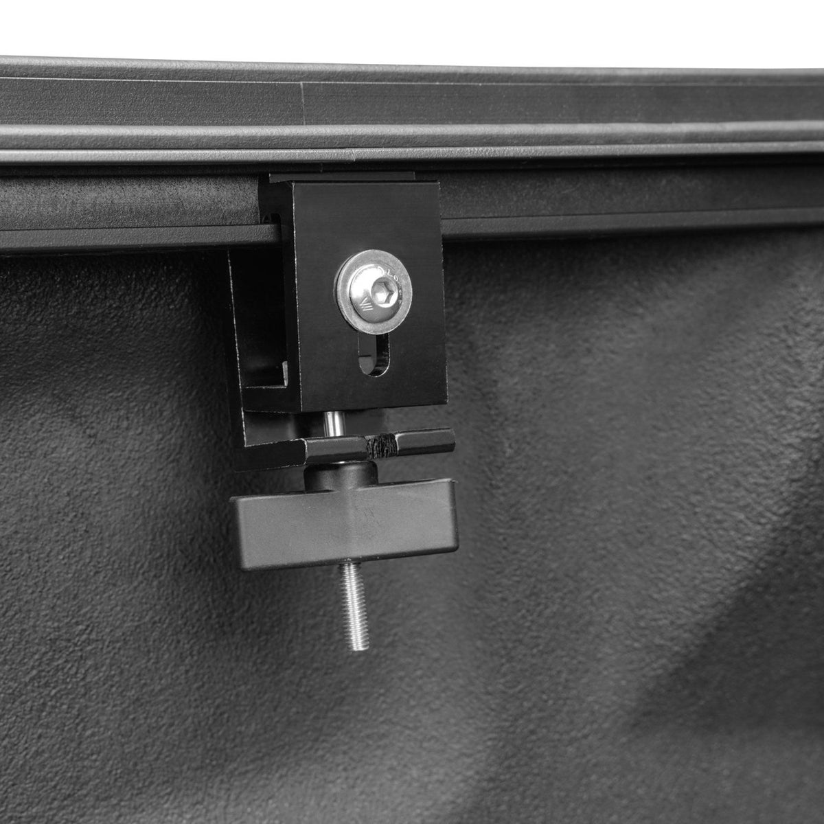 Titan Hard Flip-Back tonneau cover, close-up of the clamp and lock