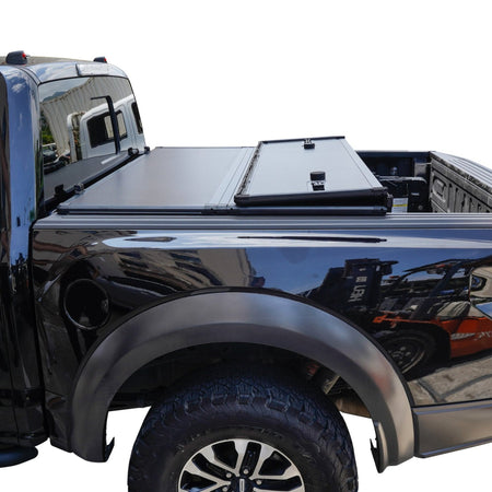 Titan Hard Tri-Fold tonneau cover folded flat against the cab