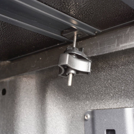 Titan Hard Tri-Fold tonneau cover, close-up of the bed-rail clamp
