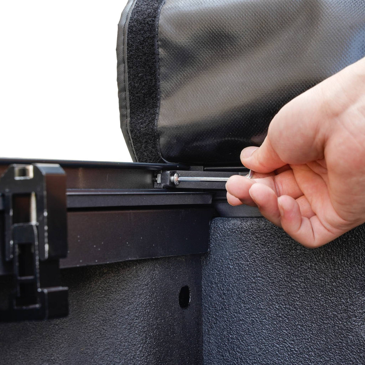 Titan Soft Roll-Up tonneau cover, close-up of the bed-rail clamp