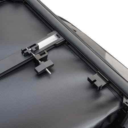 Titan Soft Tri-Fold tonneau cover, close-up of the bed-rail clamp